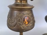 a lamp that is sitting on a table next to a lamp