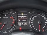 a close up of a car dashboard with various gauges and numbers