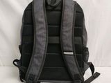 the back of a backpack with a zipper on the side