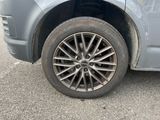 a close up of a tire on a car ' s rim