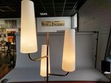 a lamp that is sitting on a table in a room