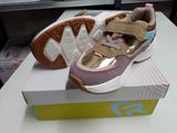 a pair of shoes that are on top of a box