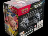a box of pokemon toys on a black background