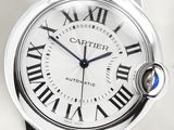 a close up of a watch with roman numerals on it