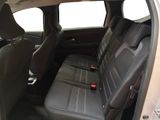 the back seats of a car are black in color