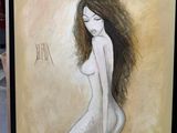 tableau représentant une femme nue aux longs cheveux, dans un cadre noir