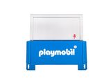 La boîte bleue de Playmobil est posée sur une table blanche.