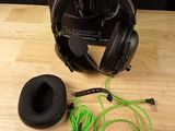 a close up of a pair of headphones on a table