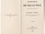 an open book with a black and white title on it
