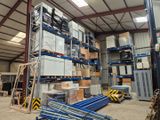 a large warehouse filled with lots of boxes and pallets