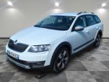 the white skc is parked in a large room with a checkered floor
