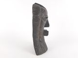 an image of a wooden sculpture of a man ' s face on a white background