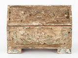 a small wooden box with a floral design on it