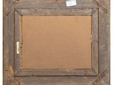 an old picture frame with a piece of paper taped to it