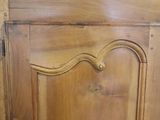 a wooden door with a wooden handle on it