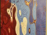 tableau représentant le visage d'une femme aux cheveux roux sur fond bleu