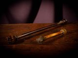 a wooden table with a pair of handles on it
