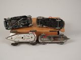 three toy cars that are sitting on top of a box