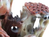 a close up of a figurine of a man and a woman