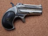 a close up of a gun on the ground
