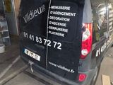 a van that is parked on the side of the street