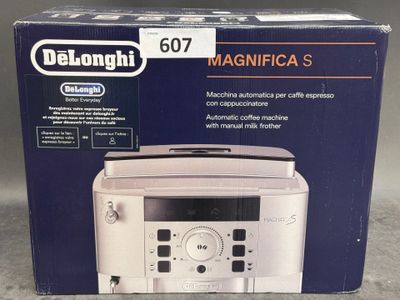 the box of the microwave is open and ready to be used