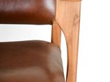 brown leather chair with wooden legs and armrests against a white background