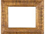a gold picture frame on a white background