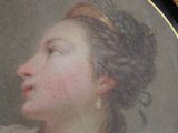painting of a woman in profile with her eyes closed