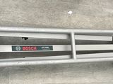 a luggage cart that is sitting on the ground