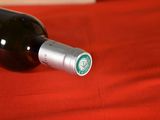 a bottle of wine that is sitting on a table