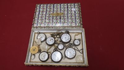 a box that has a bunch of clocks inside of it