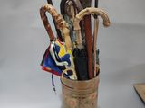 many different types of umbrellas in a cup