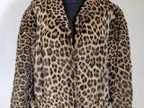 a leopard print jacket on a mannequin mannequin mannequin mannequin mannequin mannequin mannequin mannequin manne