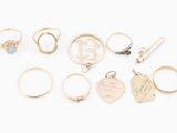 an assortment of rings and pendants,