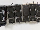 a group of speakers hanging on the wall together