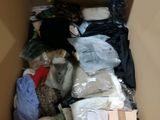 a box full of clothes and other items in it