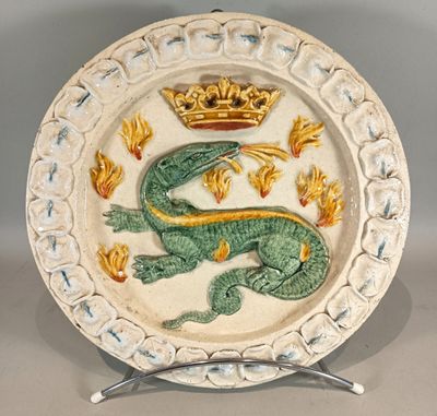 a plate with a dragon and a crown on it