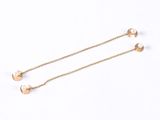 a pair of gold plated earrings on a white background