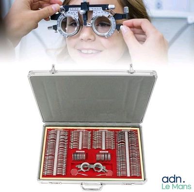 a woman that is holding a pair of glasses in front of her eye