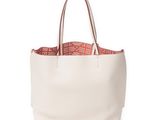 a white tote bag with a red handle