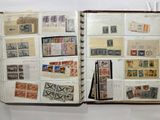 an open book with a lot of stamps on it