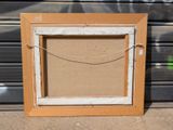 a picture of a picture frame with a picture hanging on it