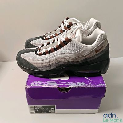 a pair of shoes that are on top of a box
