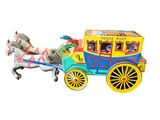 a toy horse pulling a carriage with people in it