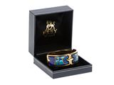 une photo d'un bracelet bleu et or dans un coffret noir