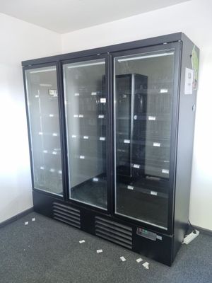 two glass doors that are open in a room