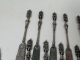 a lot of spoons that are sitting on a table