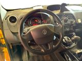 dashboard view of a car with a steering wheel and dashboard lights