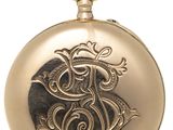 an image of a gold colored pocket watch with a dragon on it
